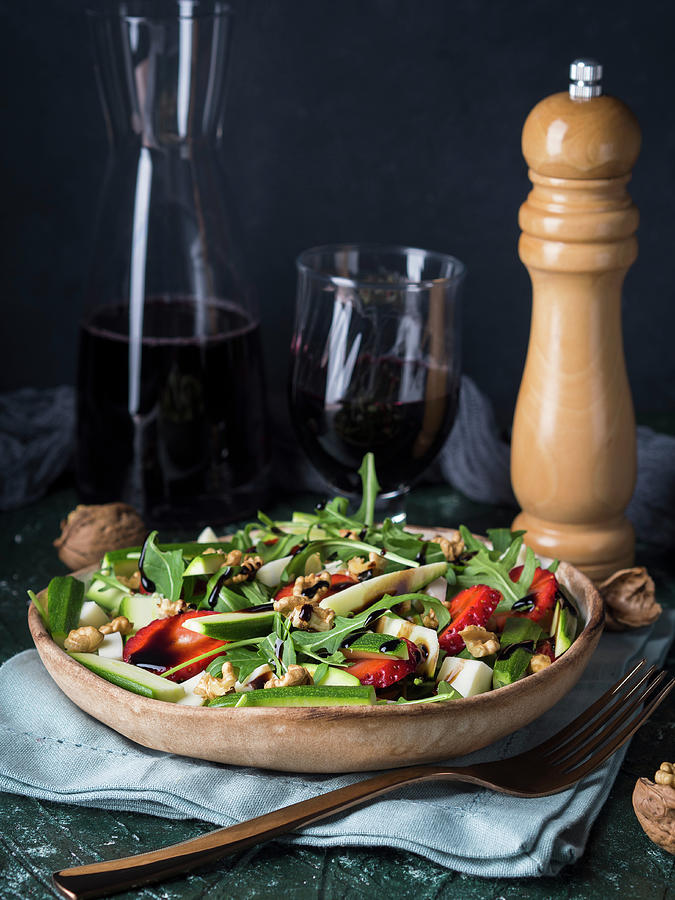 Raw Salad With Strawberries, Zucchini, Arugula, Walnuts And Cheese Drizzled With Balsamic Glaze Photograph by Sofya Bolotina