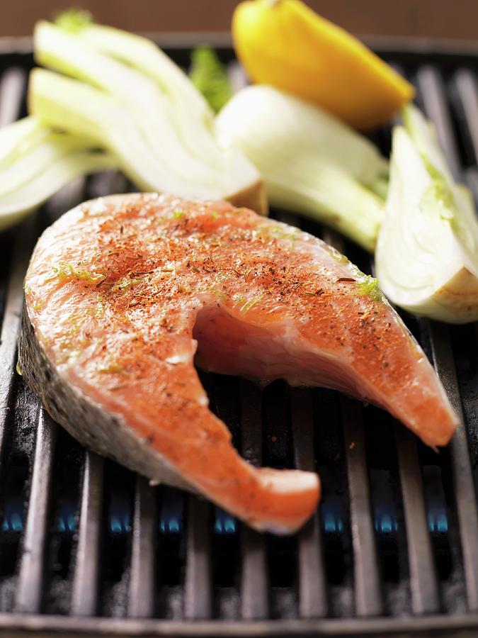 Raw Spiced Salmon Steak And Fennel On The Barbecue Photograph by Eising Studio - Food Photo & Video