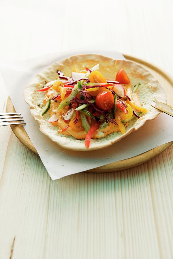Raw Vegetable Salad In A Bread Dish Photograph by Michael Wissing