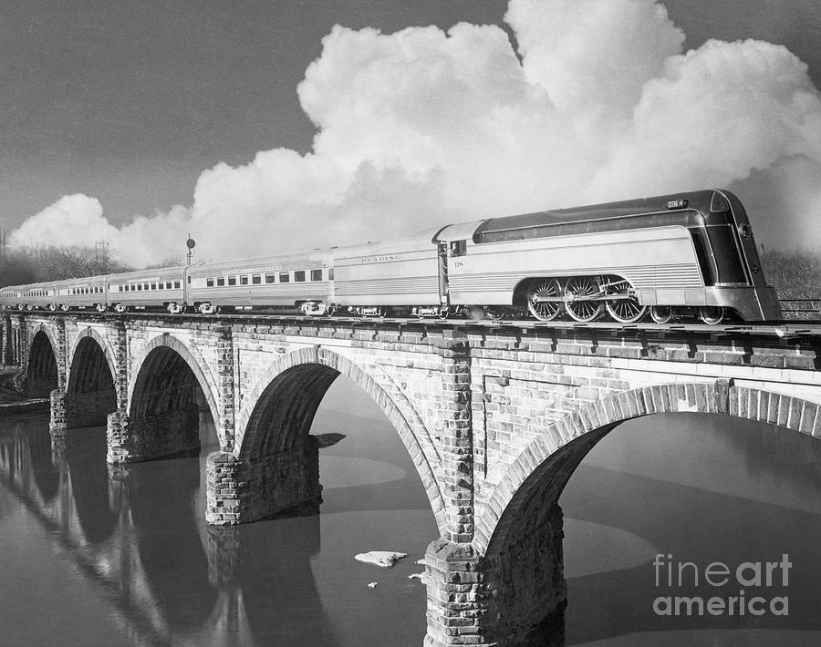 Reading Crusader Crossing Railway Bridge Photograph by Bettmann