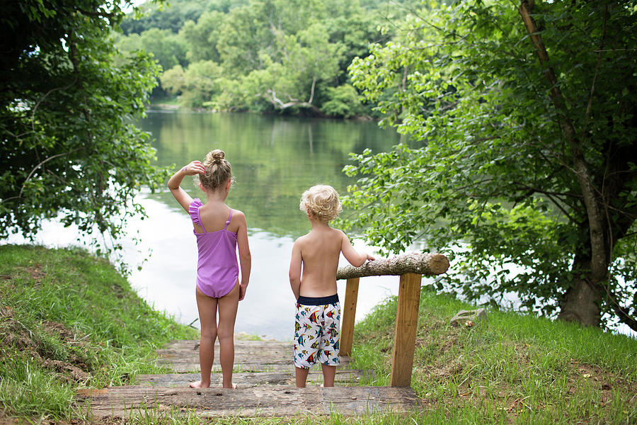 Two Young Girls In Swimsuits Standing By A Lake Wood Print by Cavan Images  - Pixels