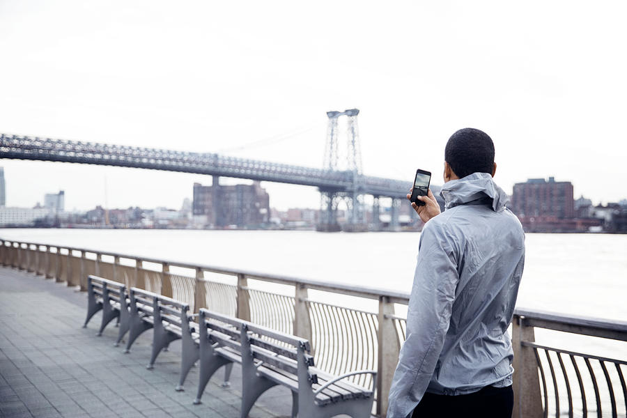 Rear View Of Male Athlete Photographing Williamsburg Bridge Photograph ...