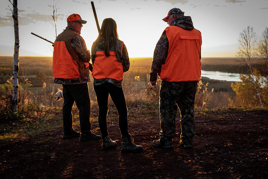 Rear View Of Three People Going Photograph by Joel Sheagren