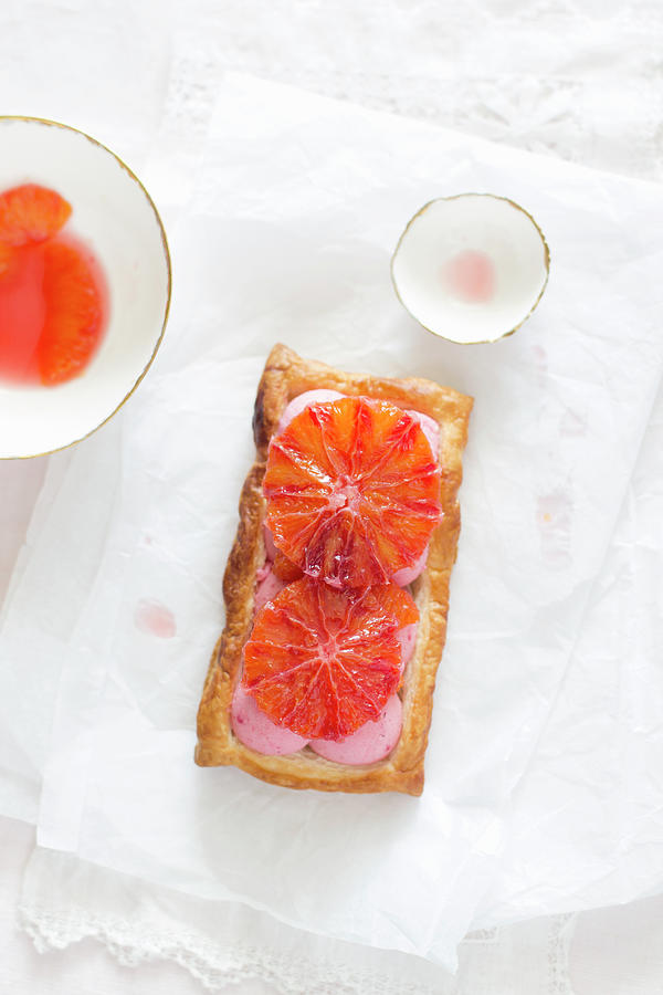 Rectangular Puff Pastry Tartlet With Pink Strawberry Mousse And Blood Orange Slices Photograph by Zappie