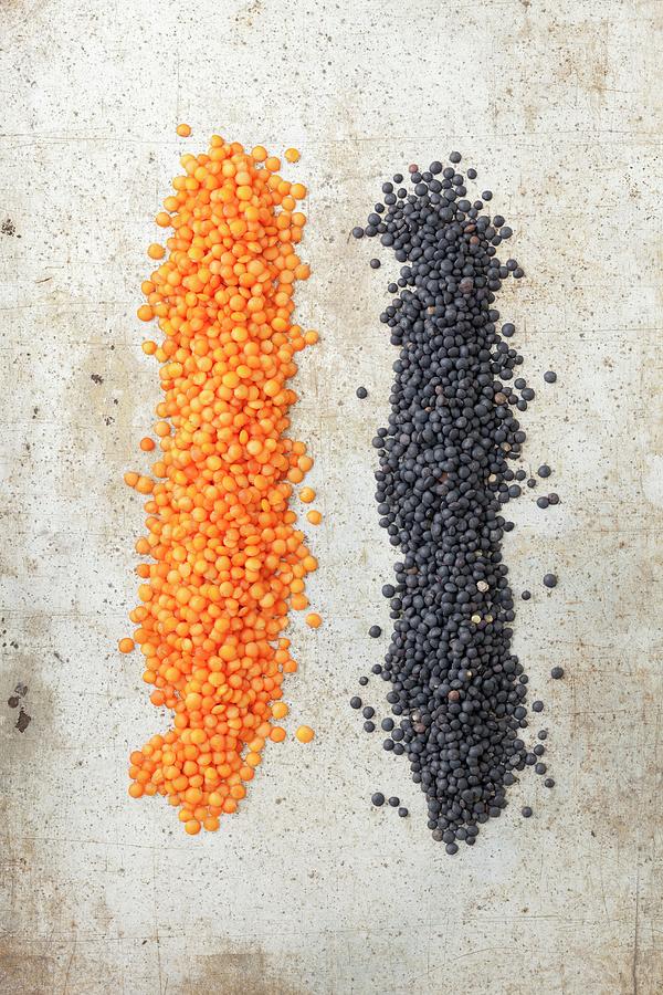 Red And Black Lentils On A Stone Surface Photograph by Rua Castilho