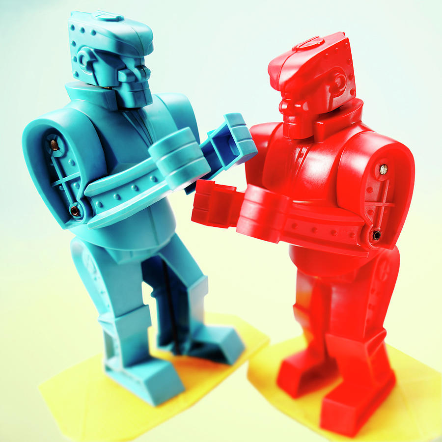 Science Fiction Drawing - Red and Blue Robots Fighting by CSA Images
