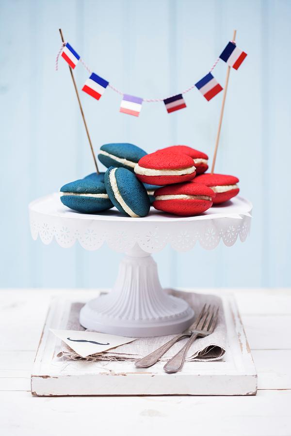 Red And Blue Whoopie Pies Filled With Cream Cheese Frosting Photograph by Great Stock!