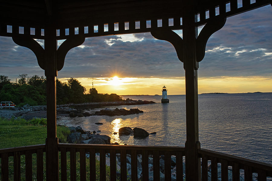 Red and Gold sunrise Salem MA Winter Island Fort Pickering Light From the Gazebo Photograph by Toby McGuire