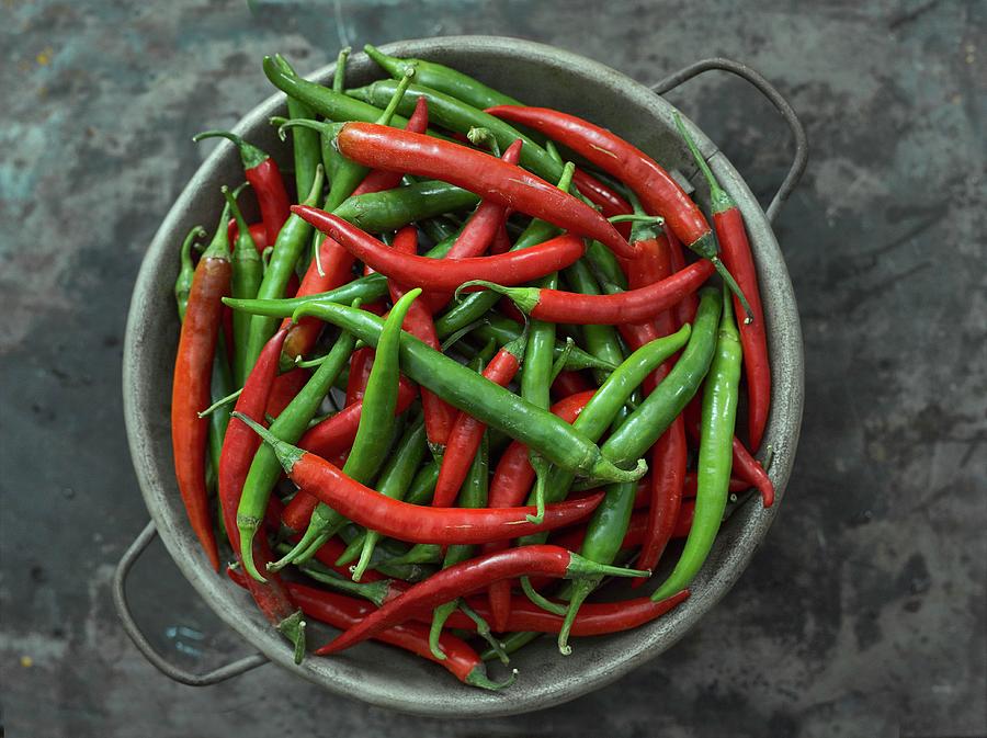 Red And Green Chilli Peppers In A Metal Bowl Photograph by Yehia Asem El Alaily