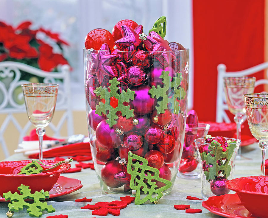 Red And Pink Tree Decorations In A Large Glass Vase, Green Felt Tags Photograph by Friedrich Strauss