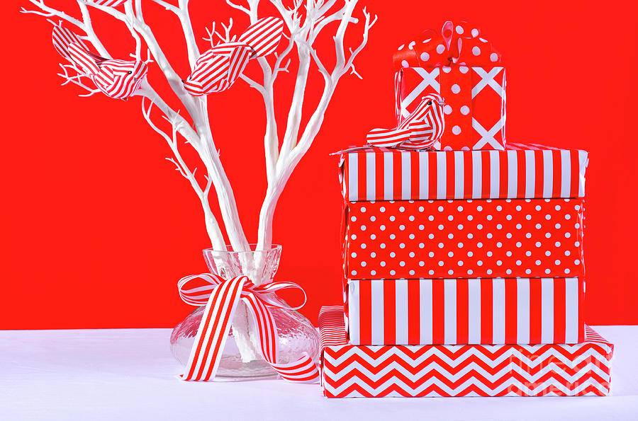 Red and White Christmas Gifts Photograph by Milleflore Images