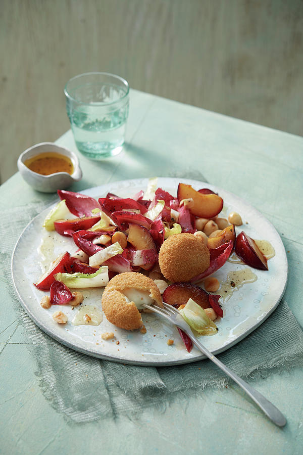Red And Yellow Chicory Salad With Baked Mozzarella, Red Plums And Nut Dressing Photograph by Jan-peter Westermann