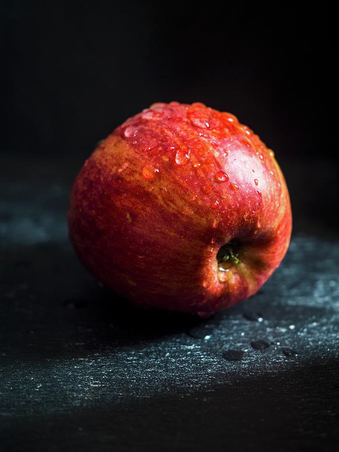 Red Apple On A Dark Background Photograph by Magdalena Paluchowska
