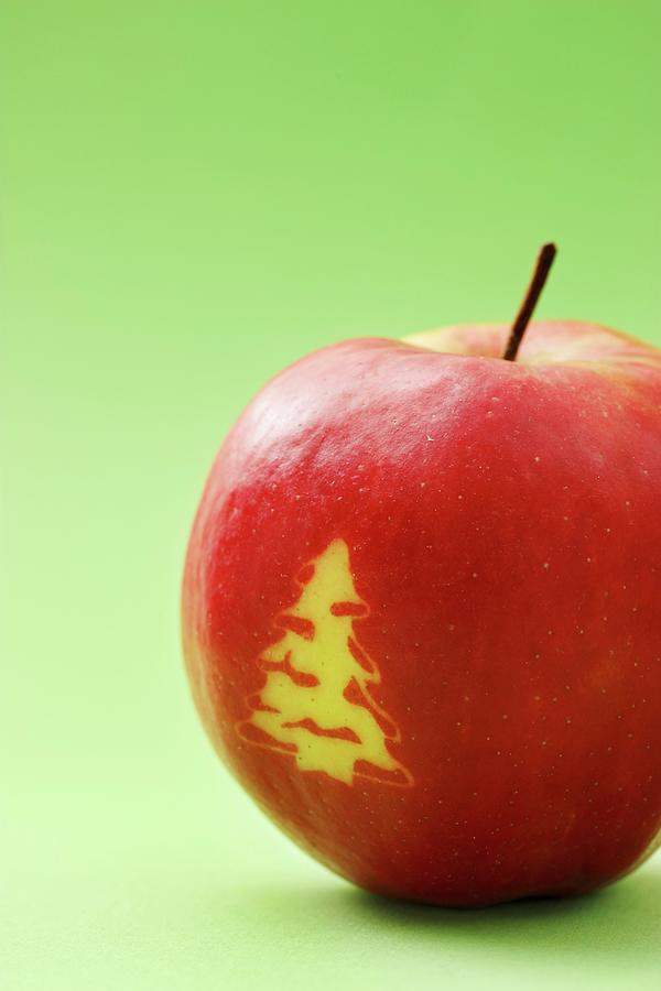 Red Apple With A Christmas Tree Photograph by Petr Gross