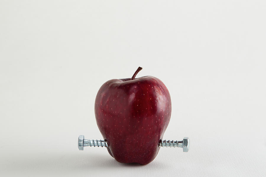 Red Apple With Bolts Photograph by Vivida Photo PC