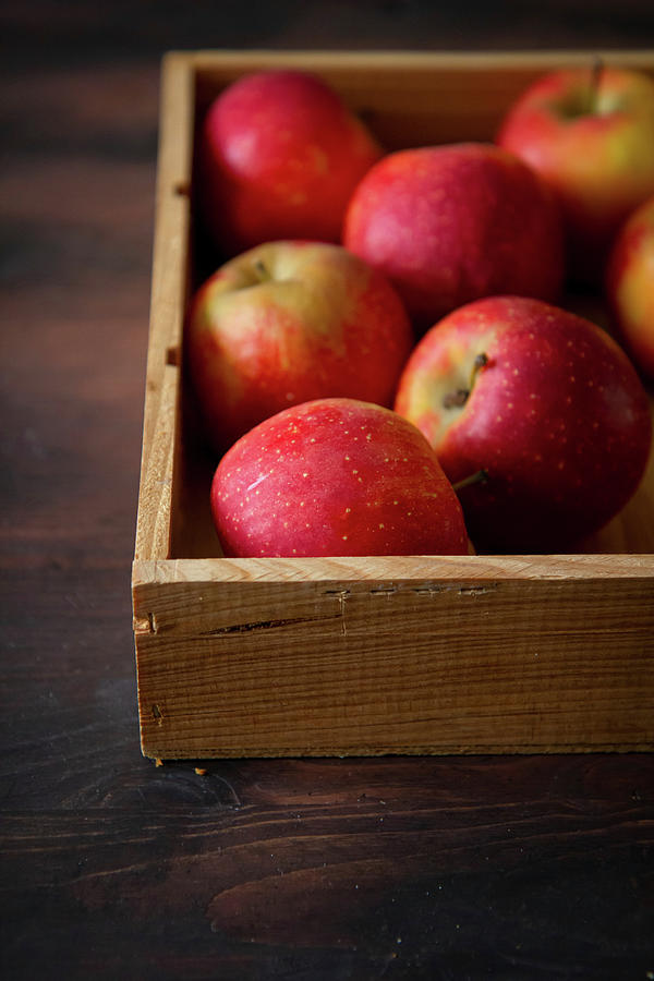 Red Apples In A Wooden Box Photograph by Patricia Miceli