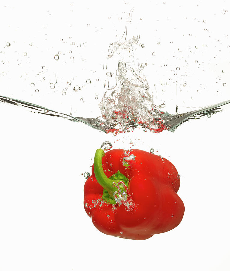 Red Bell Pepper Splashing Photograph by Don Farrall