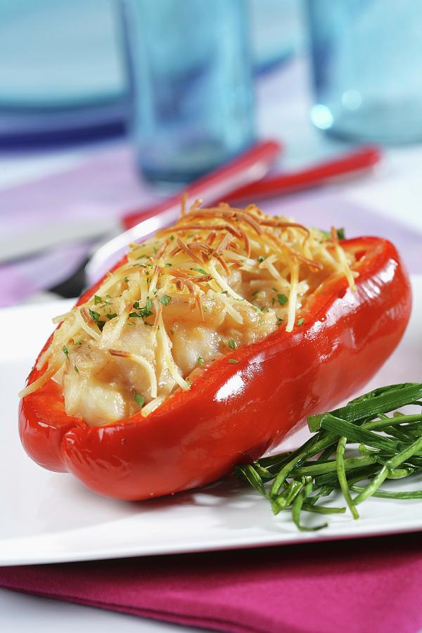 Red Bell Peppers Stuffed With Hake And Shrimps Photograph by Gastromedia