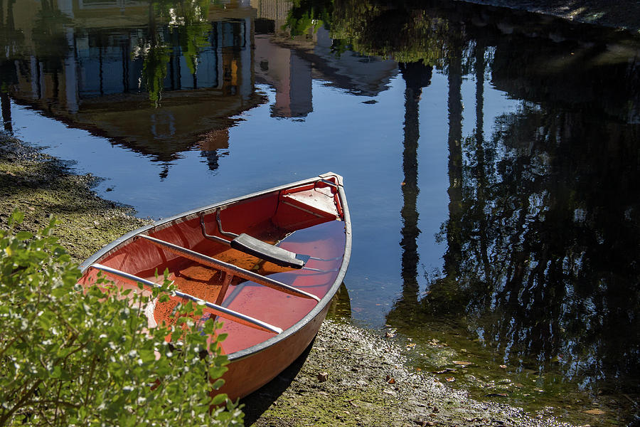 Red Boat on Canal Shore Photograph by Roslyn Wilkins