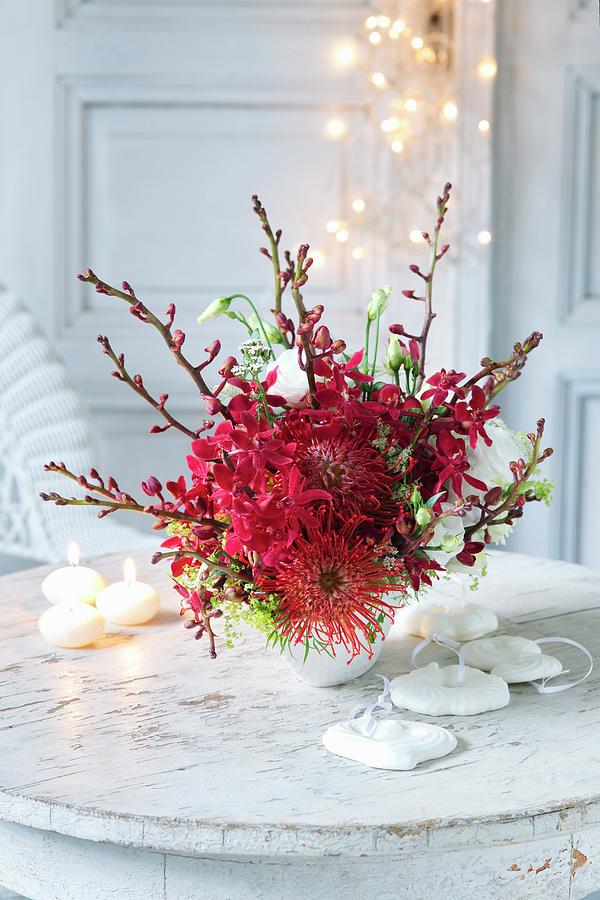Red Bouquet Of Protea, Orchids And Lisianthus Photograph by Alena Hrbkov