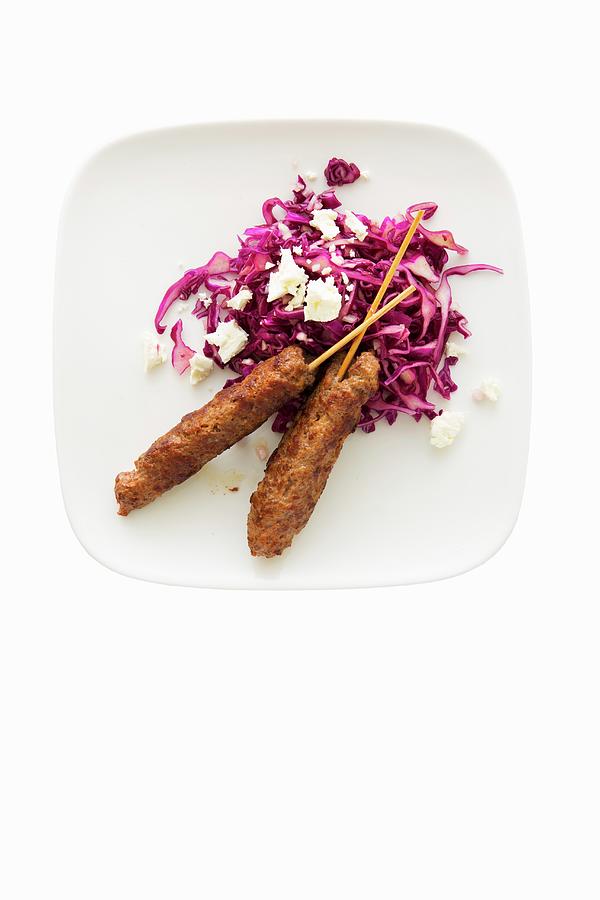 Red Cabbage Salad With Cinnamon, Feta Cheese And Minced Meat Skewers Photograph by Jalag / Stefan Bleschke