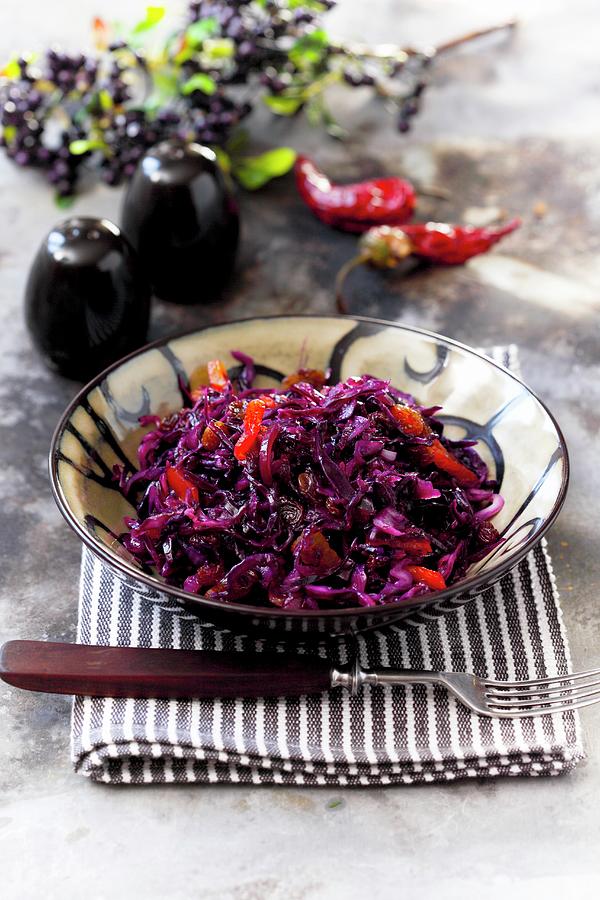 Red Cabbage With Raisins And Chilli Peppers Photograph by Boguslaw Bialy