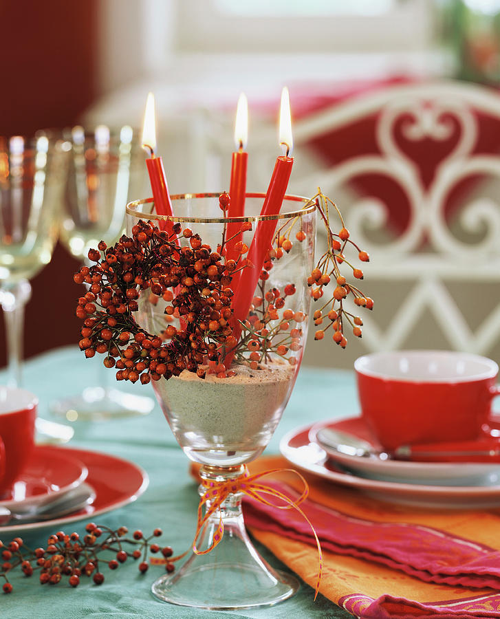 Red Candles In A Wine Glass With Small Rose Hip Wreath Photograph by Strauss, Friedrich