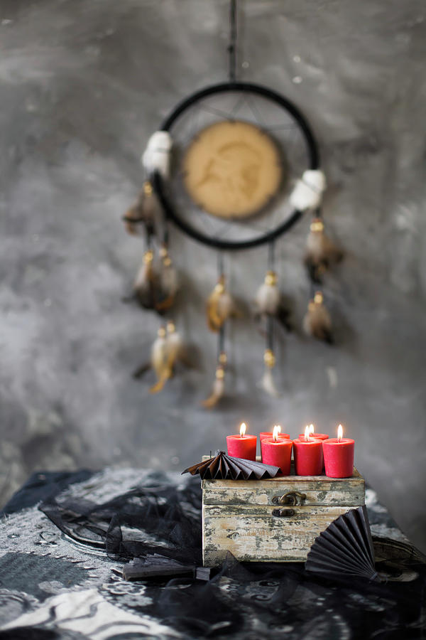 Red Candles On Top Of Old Wooden Box And Mystical, Ethnic Accessories In Grey Photograph by Alicja Koll