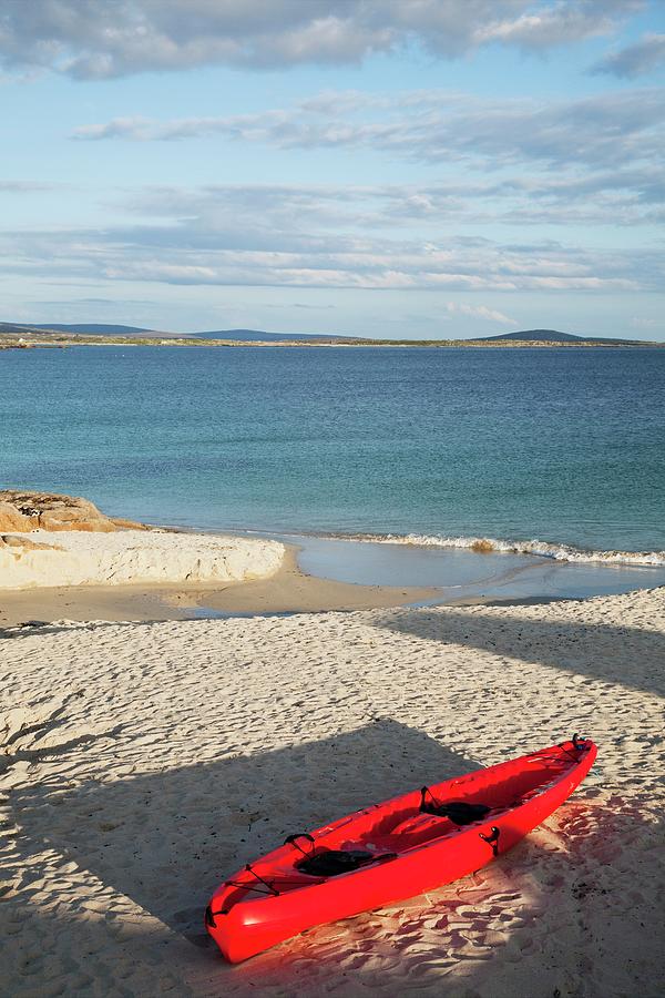 Red Canoe On Beach Photograph by Design Pics / Peter Zoeller