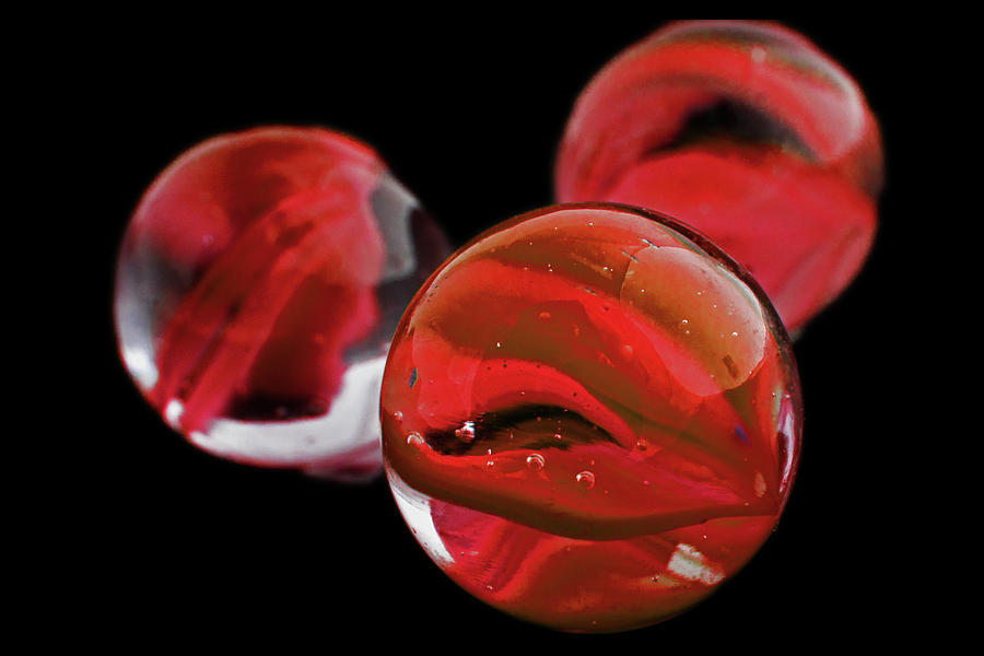 Red Cats Eye Marbles Photograph by Ira Marcus