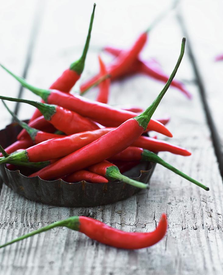 Red Chillies Photograph by Mikkel Adsbl