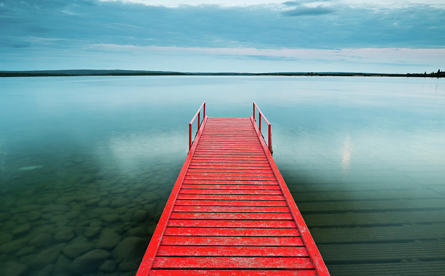 Red Dock With Moody Sky Photograph by Stephanehachey