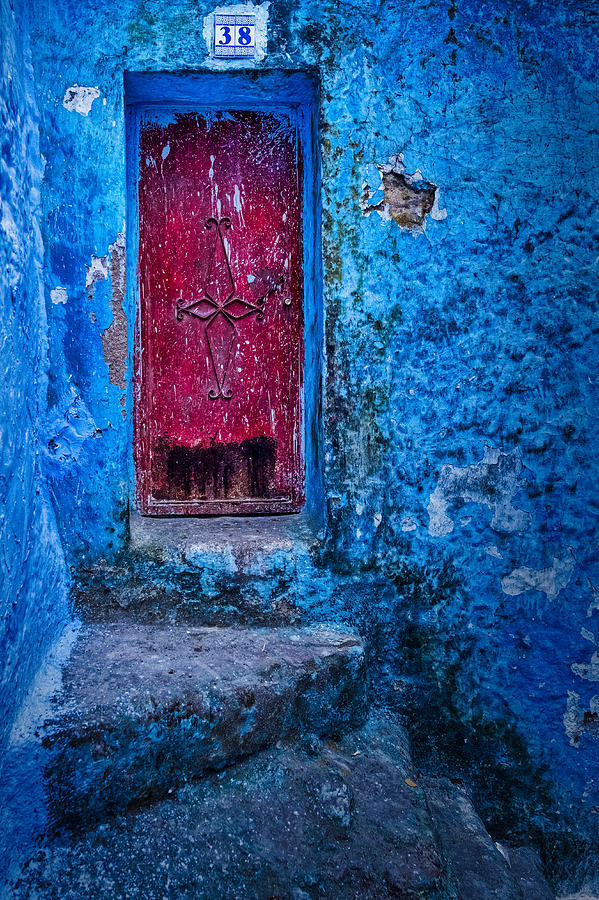 Architecture Photograph - Red Door in a Blue Wall - Morocco by Stuart Litoff