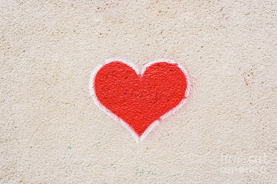 Red Heart Painted On A Wall, Message Of Love. Photograph