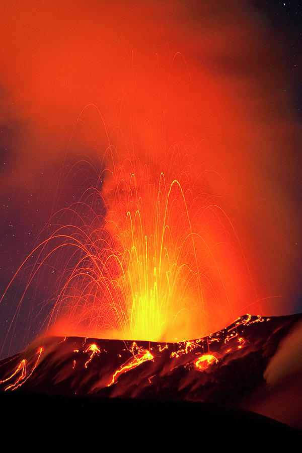 Red Hot Lava And Sparks Erupting From The Tavurvur Volcano At Night ...