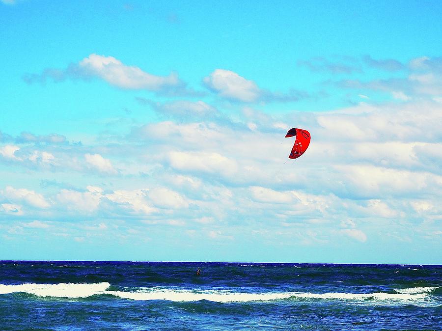 Red Sail Over The Ocean Photograph by Alida M Haslett