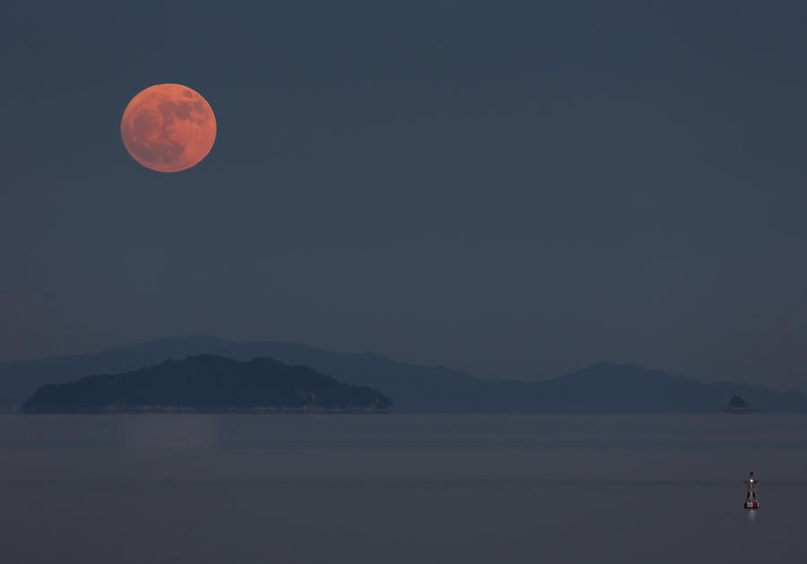Red Moon Rising Over The Hazy Seto Inland Sea_01 Photograph by Sunao Isotani