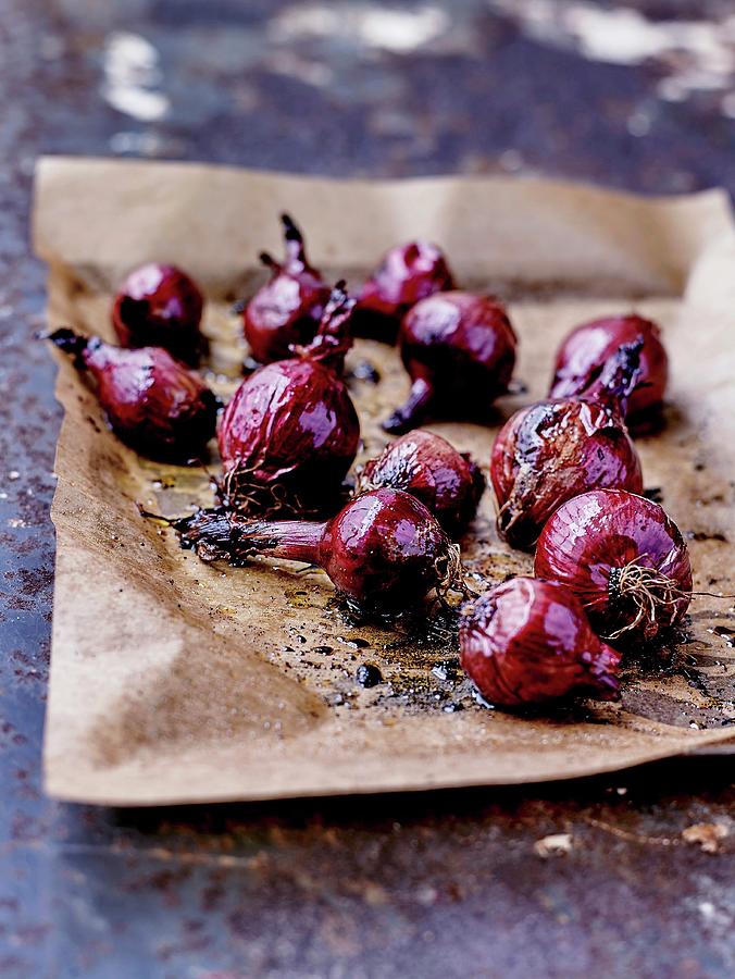 Red Onions Pickled In Balsamic Vinegar On Wax Paper Photograph by Amiel