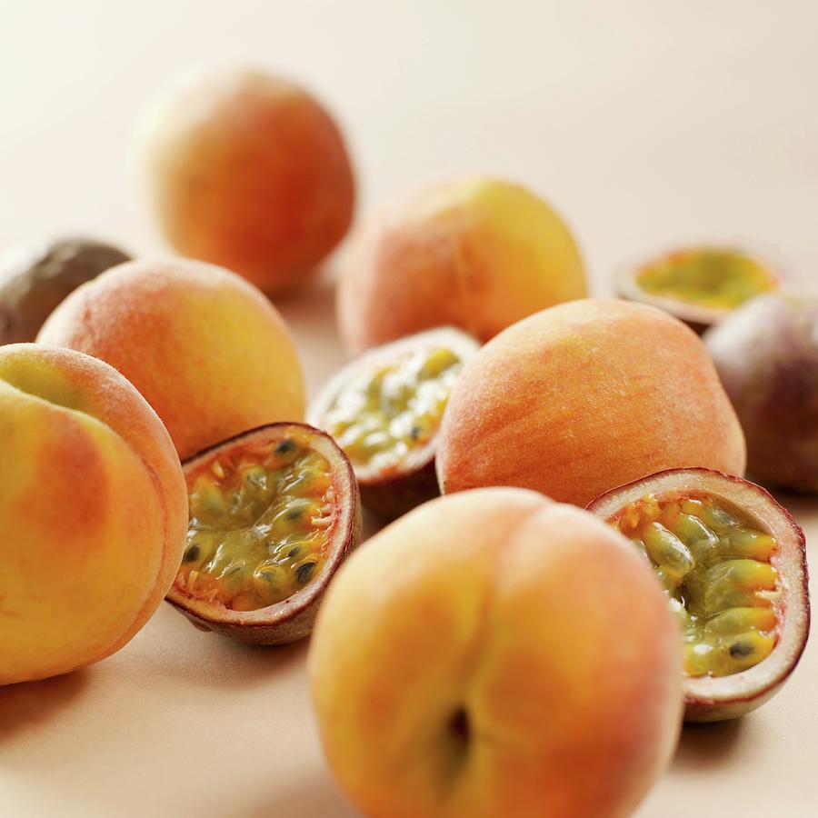 Red Passion Fruits And Peaches Photograph by Robert Morris