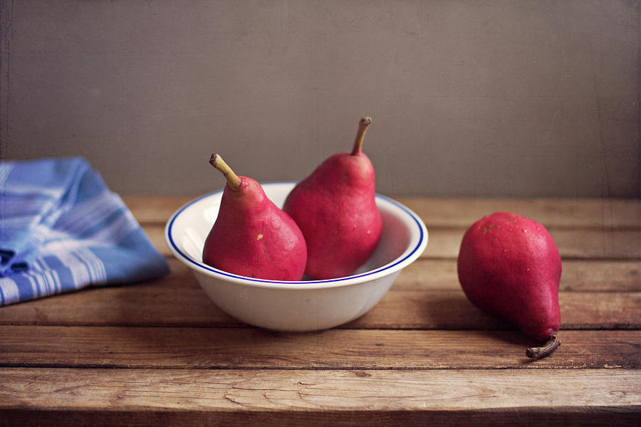 Red Pears In White Bowl Photograph by Copyright Anna Nemoy(xaomena)