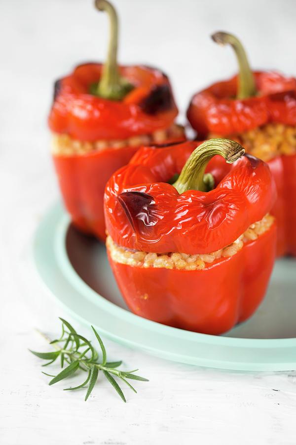Red Peppers Stuffed With Barley And Rosemary Photograph by Malgorzata Laniak