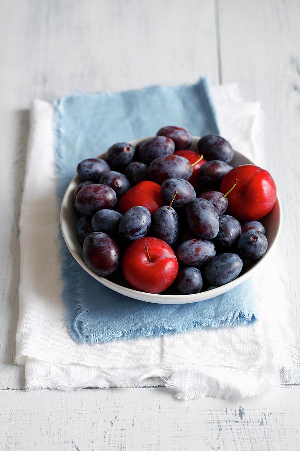 Red Plums And Damsons Photograph by Rua Castilho
