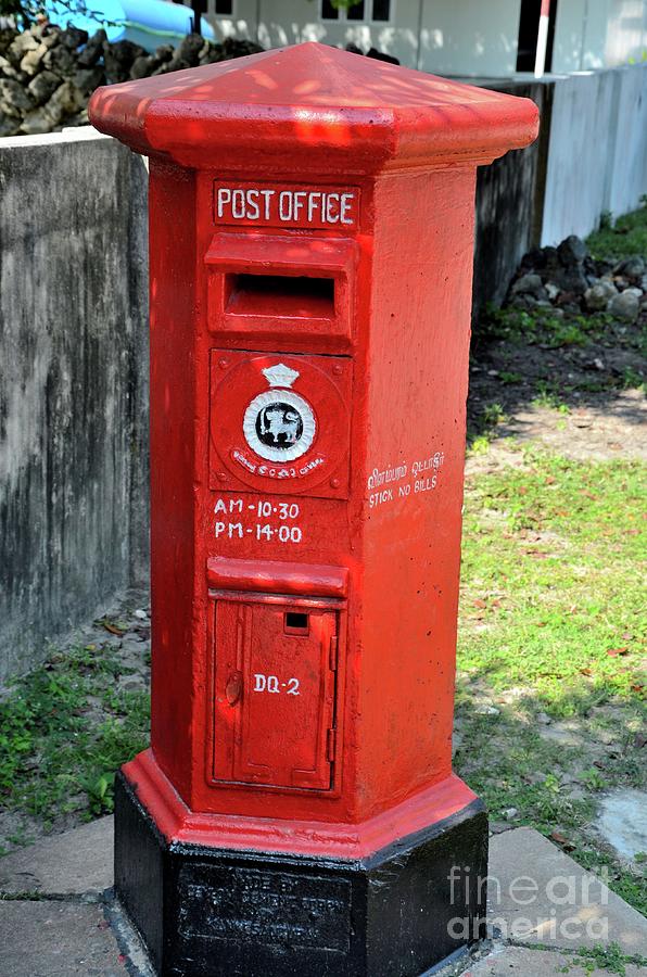 Red postal letter box Sri Lankan Post Delft island Jaffna Sri Lanka Photograph by Imran Ahmed