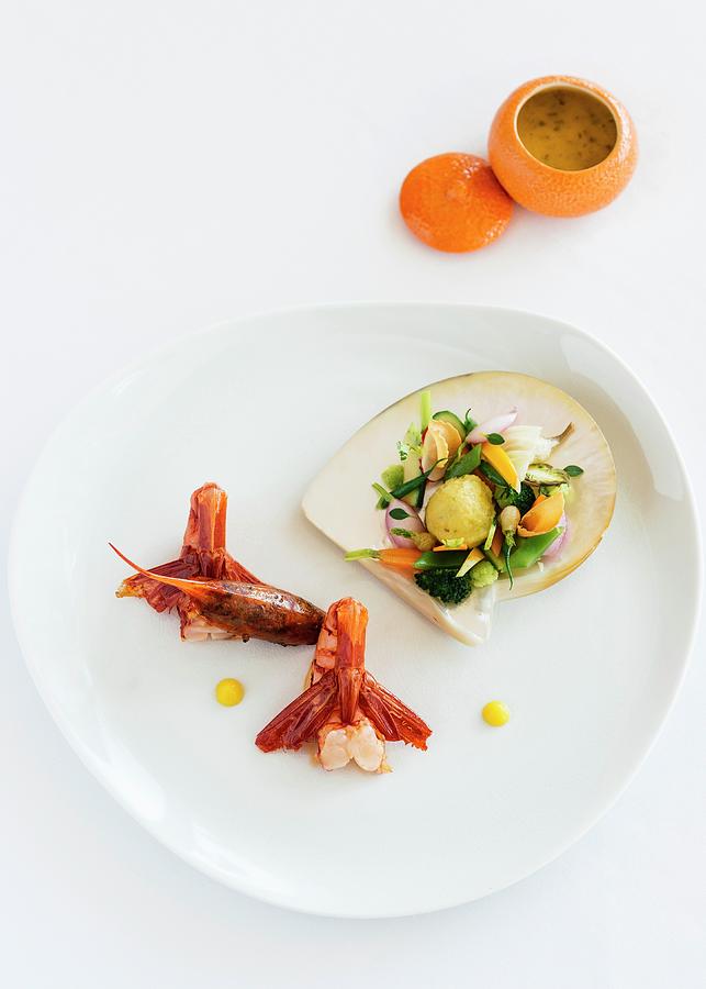 Red Prawns Prepared By The Head Chef Arnaud Donckele At The La Vague Dor Restaurant In Saint-tropez Photograph by Jalag / Anthony Lanneretonne