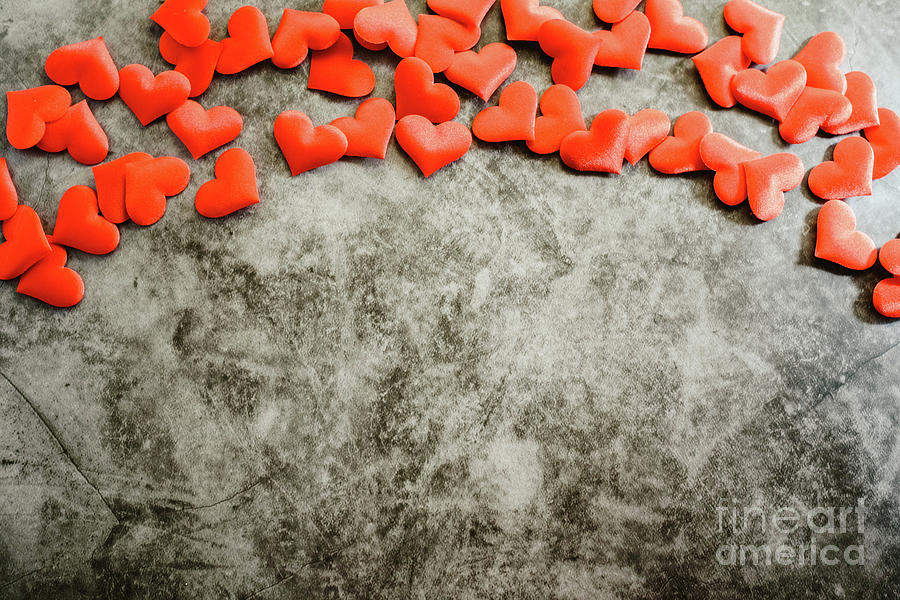 Red romantic hearts framing a textured marble background for use on Valentines Day Photograph by Joaquin Corbalan