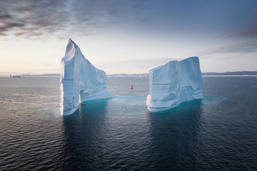 Summer Photograph - Red sail and Icebergs in Greenland by Suranga Weeratunga