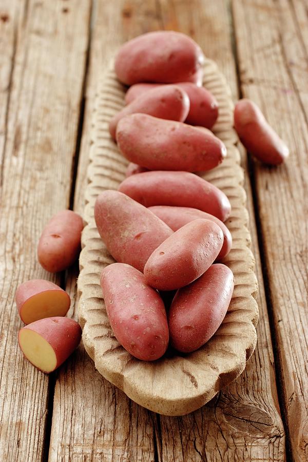Red-skinned cherie Potatoes In A Wooden Dish Photograph by Petr Gross