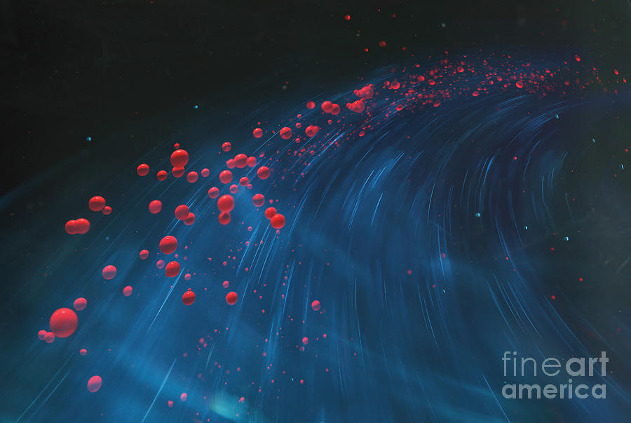 Red Spheres Flying On Blue Background Photograph by Stanislaw Pytel