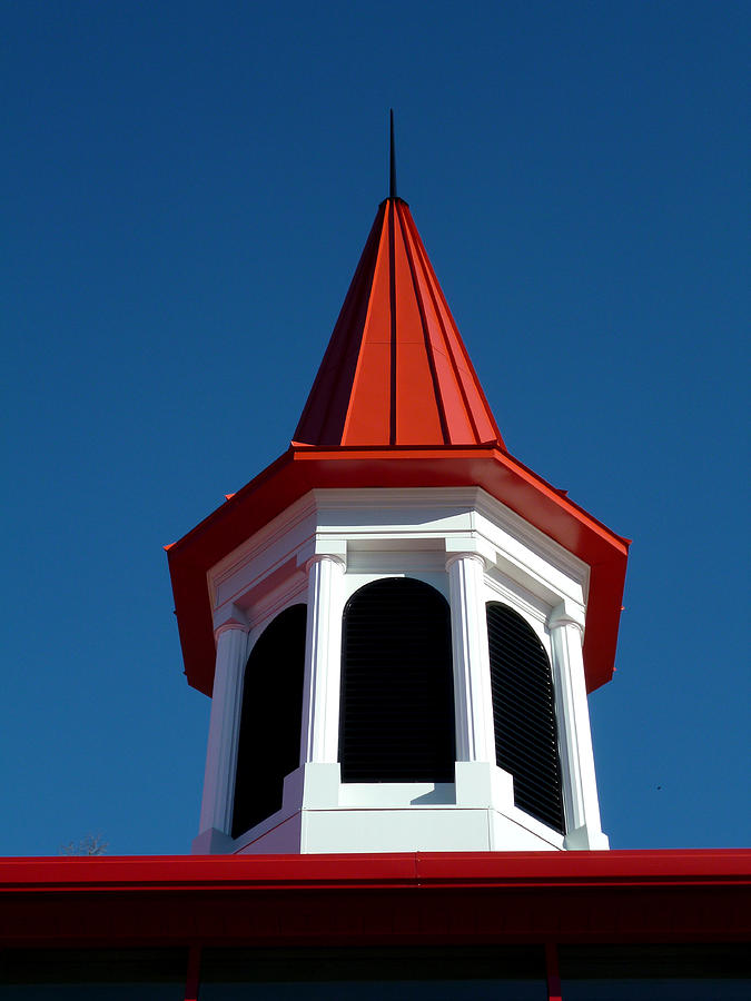 Red Spire Against Blue Sky Photograph by Mike McBrayer