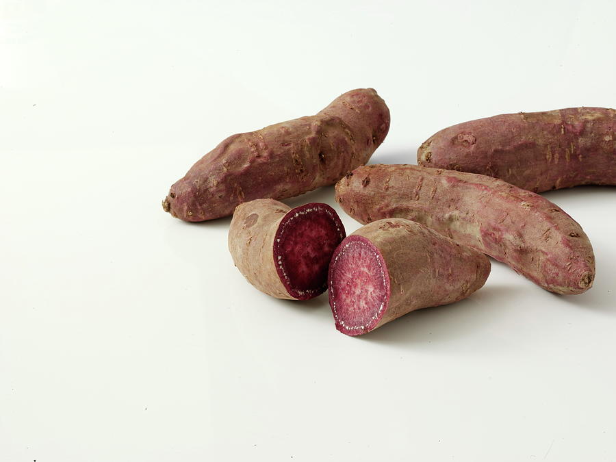 Red Sweet Potato On White Background Photograph by Chris Ted
